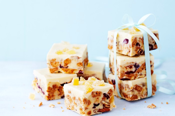 Squares of white chocolate and cranberry tiffin, in a gift formation
