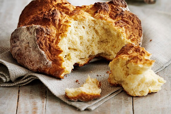 Soda bread with chunk torn off