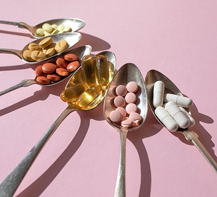 6 spoons containing various supplements