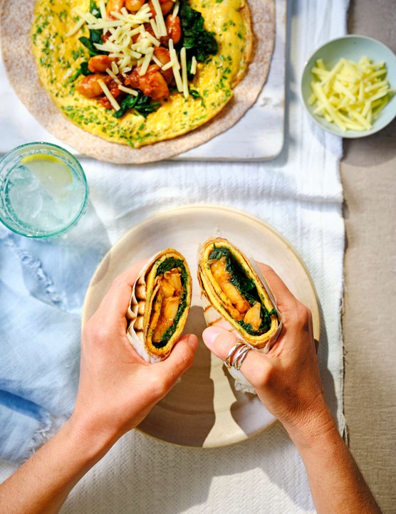 An omelette wrap cut in half