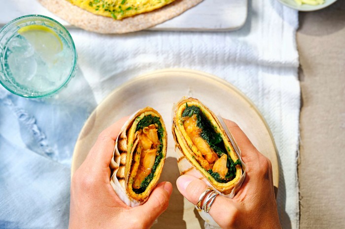 An omelette wrap cut in half