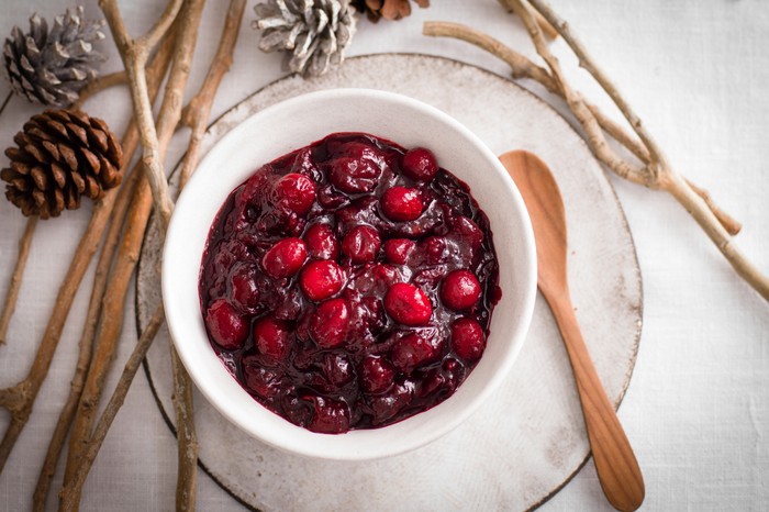 A small pot of cranberry sauce
