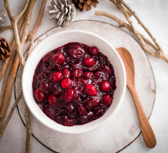 A small pot of cranberry sauce