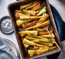 Honey-roasted parsnips with rosemary on a baking tray