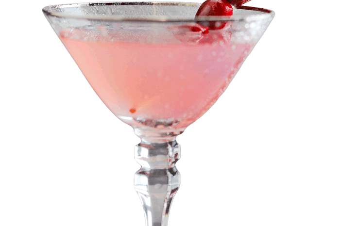 Pink cranberry gimlet in a martini glass